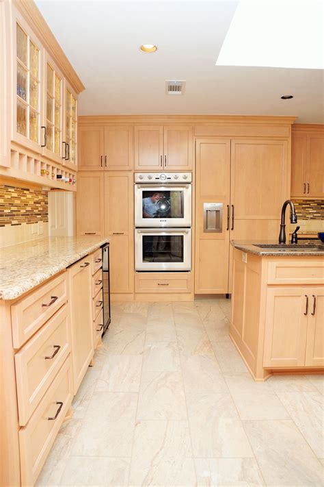 natural maple cabinets with stainless steel appliances|maple cabinets with white countertops.